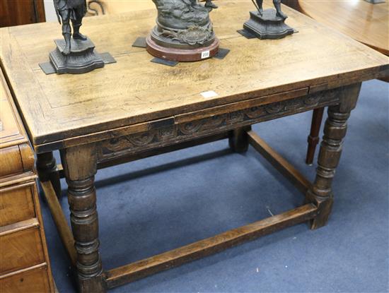 A 17th century style oak draw leaf table, W.4ft D.2ft 8in. H.2ft 6in.